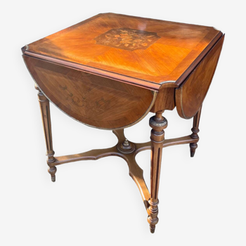 Center table decorated with marquetry of leaves and flowers in Louis XVI style, 19th century period