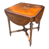 Table de centre à décor de marqueterie de feuilles et de fleurs de style Louis XVI époque XIX eme siècle