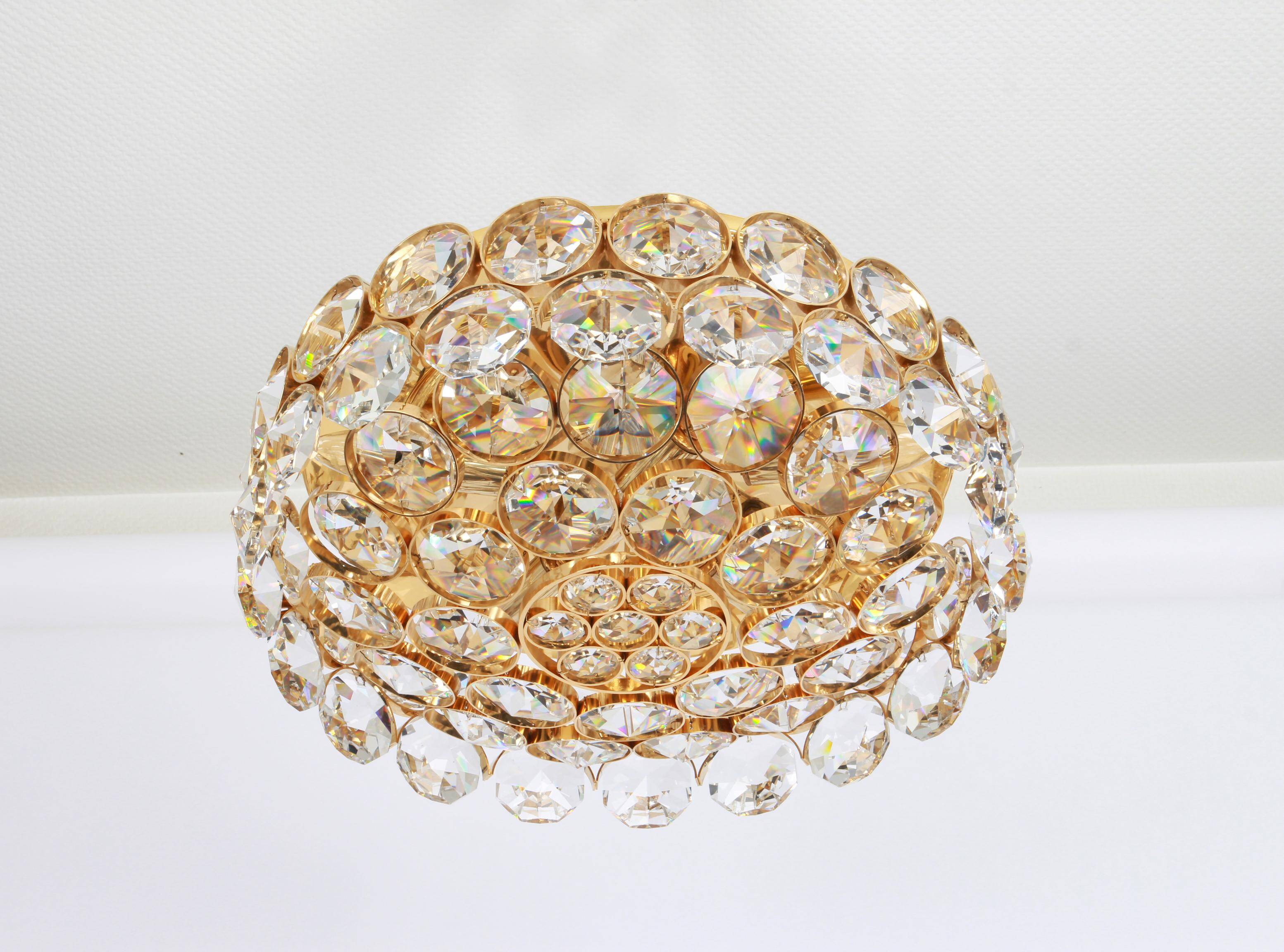 Chandelier in gilded brass and crystal glass inlaid by Palwa, Germany, 1970s.