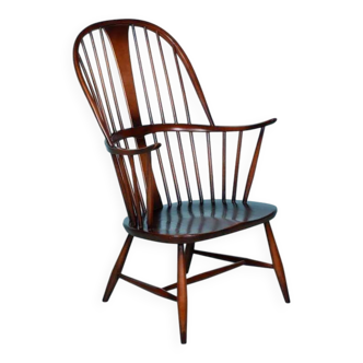 Ercol model 472 fireplace chair from the 1960s in beech.