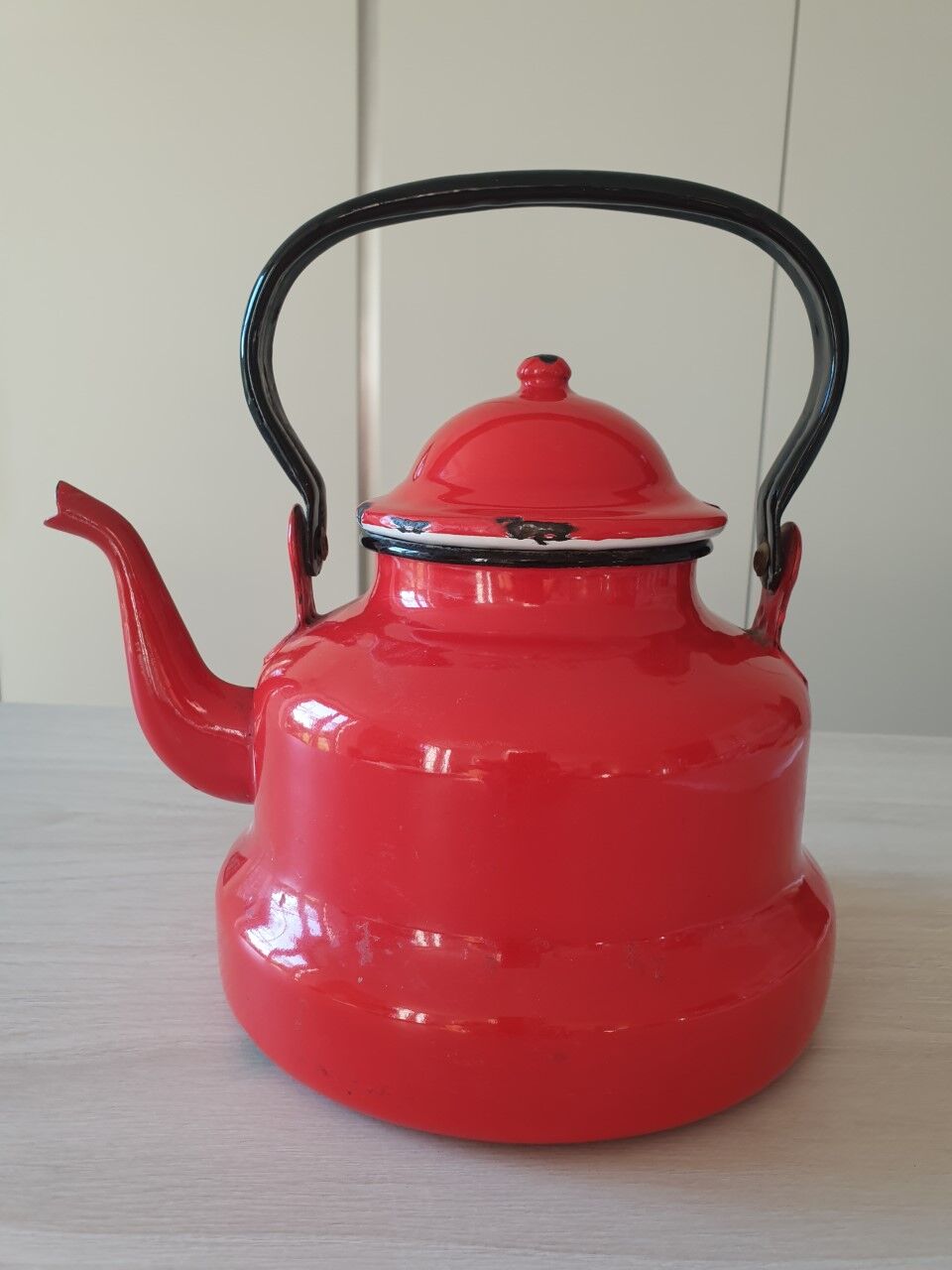 Vintage enamelled sheet metal kettle