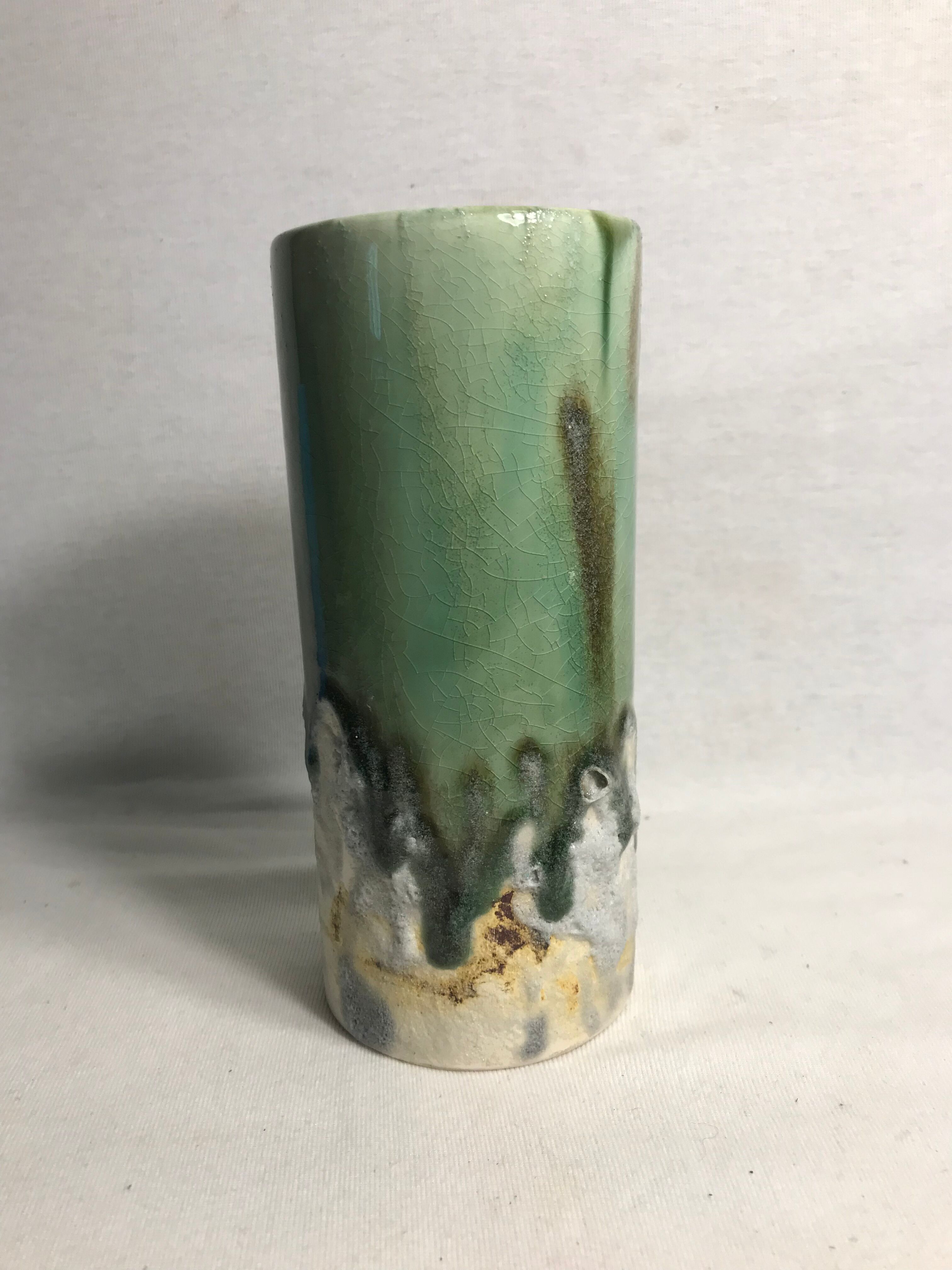Roll old glazed ceramic vase green