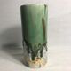 Roll old glazed ceramic vase green