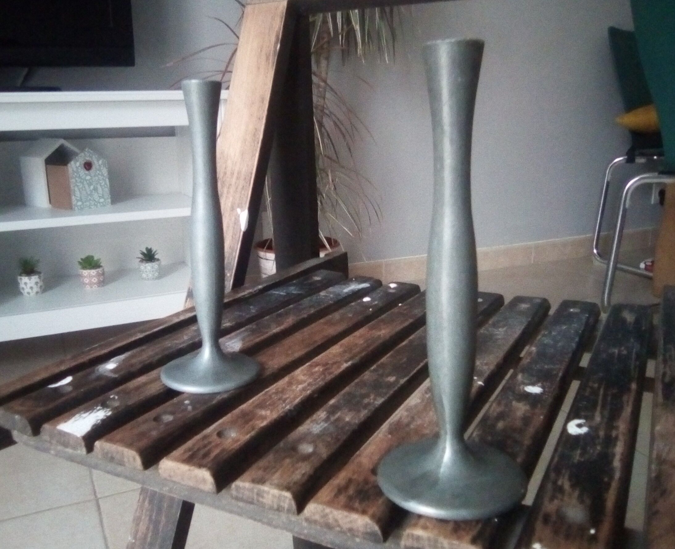 Pair of old tin candlesticks