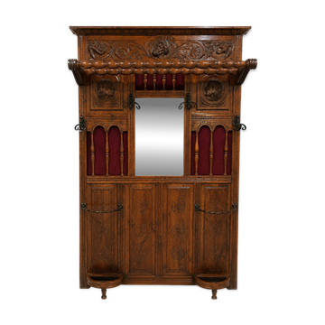 Antique neo-Renaissance hall coat rack with mirror and umbrella stand.