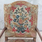 Paire de fauteuils Régence en noyer sculpté