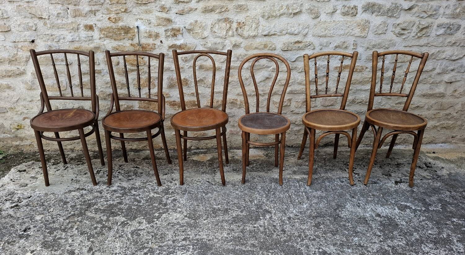 6 mismatched bistro chairs