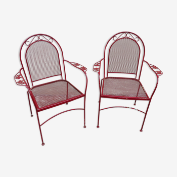 Pair of wrought iron garden armchairs