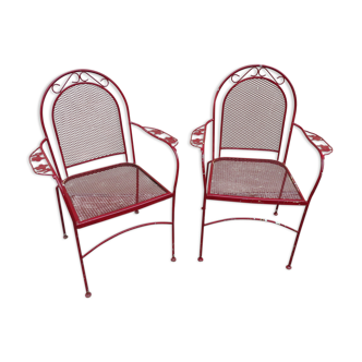 Pair of wrought iron garden armchairs