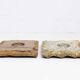 Pair of travertine candlesticks