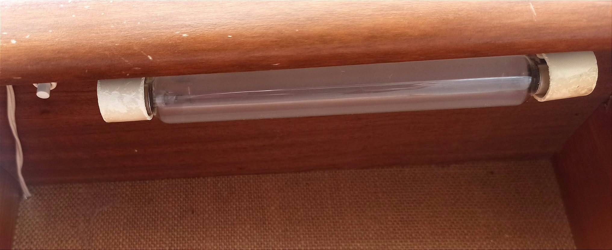 Pair of bedside tables with integrated lighting, 1970s.