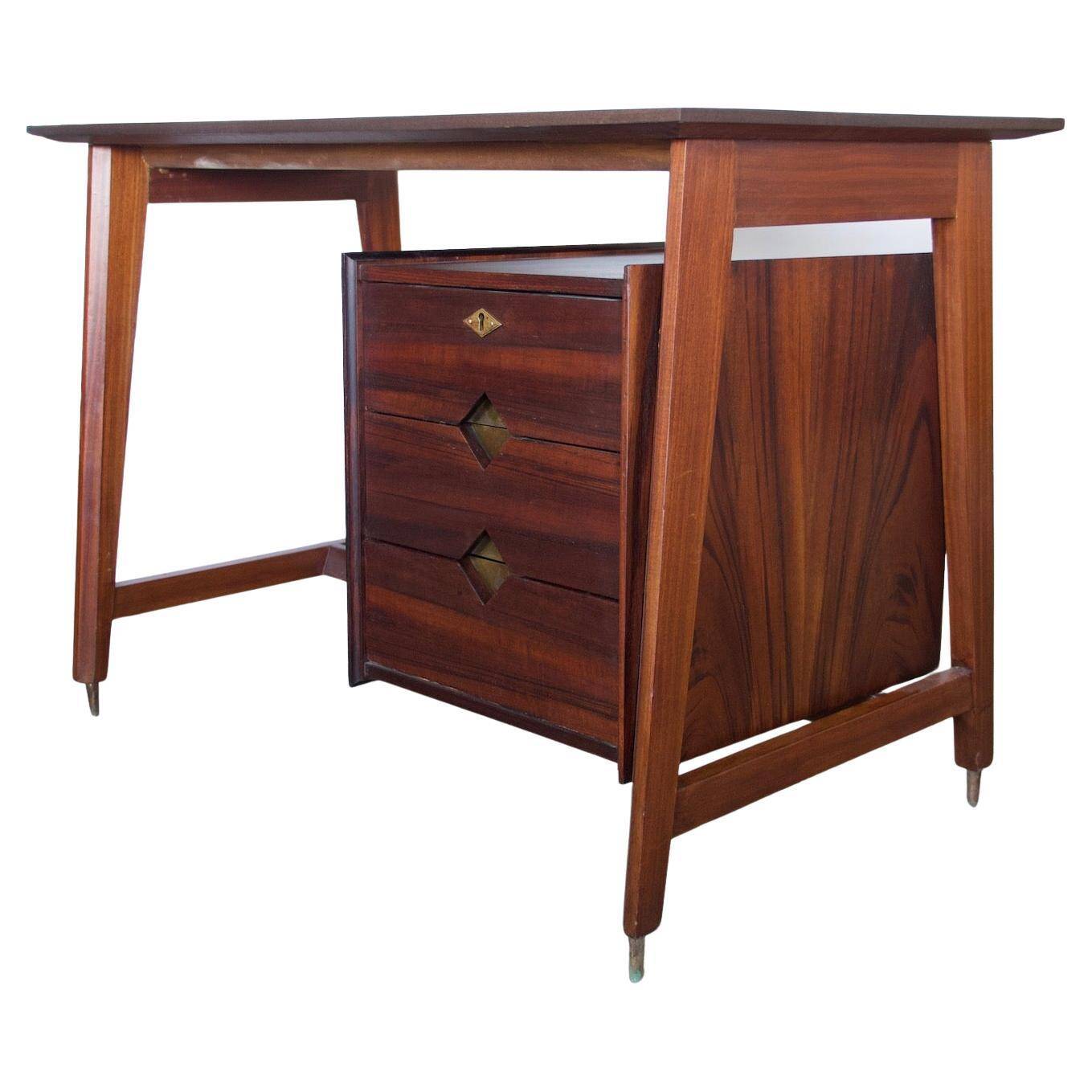 Small Italian wooden desk with brass details.