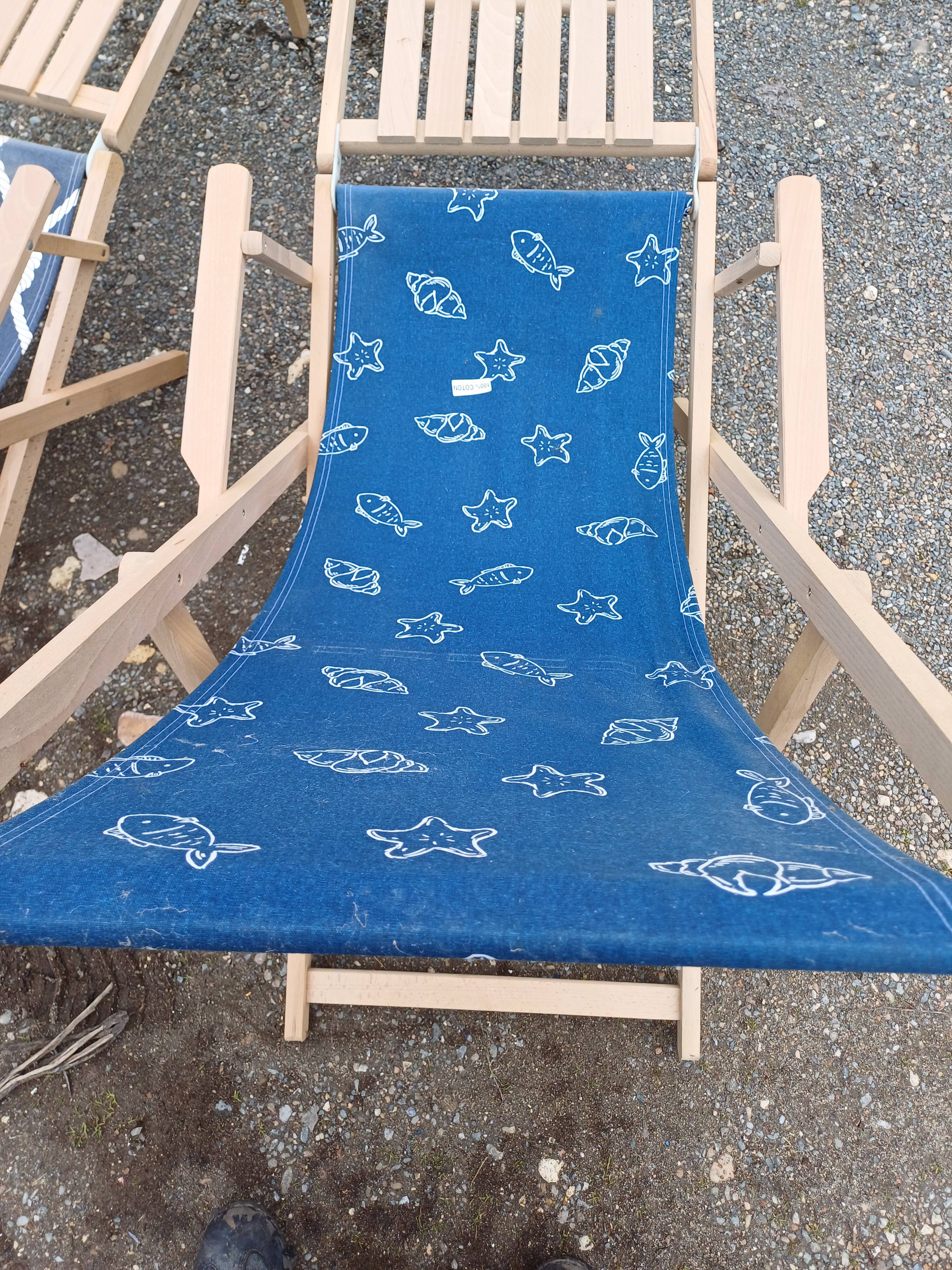 Pair of wood and fabric long chairs