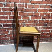 Set of a chair and an armchair in wood and yellow fabric