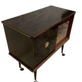 Vintage display bar cabinet on wheels from the 60s/70s.