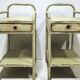 Copy of a pair of patinated metal bedside tables.