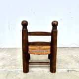 Brutalist chair in wood and straw
