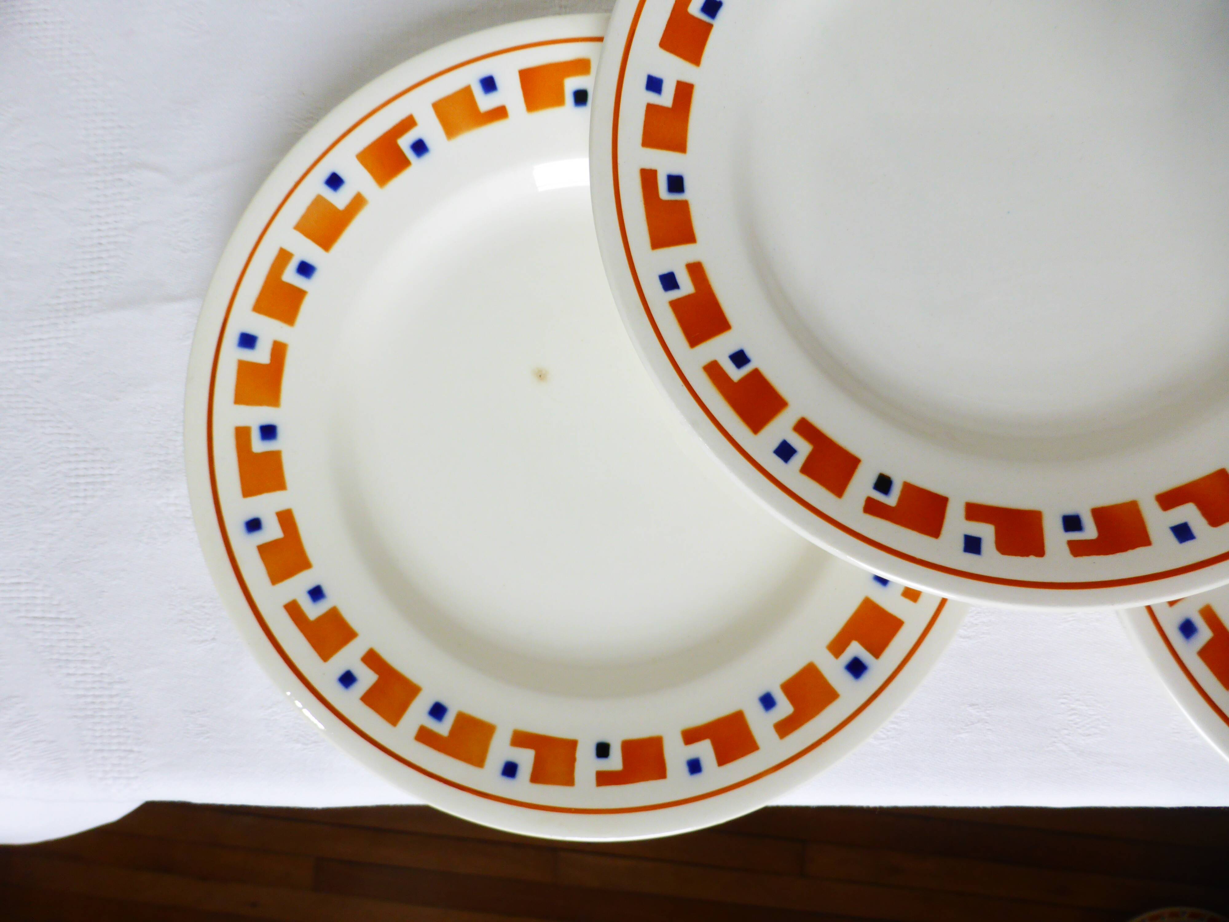4 flat plates in iron earth from Salins, Lucette model 210809