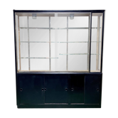 Store window with sliding doors in matte black patinated oak - 30s