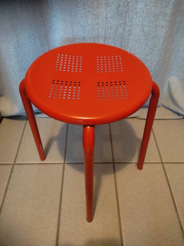 Patinated metal stool