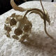 Ecru metal flower wall sconce