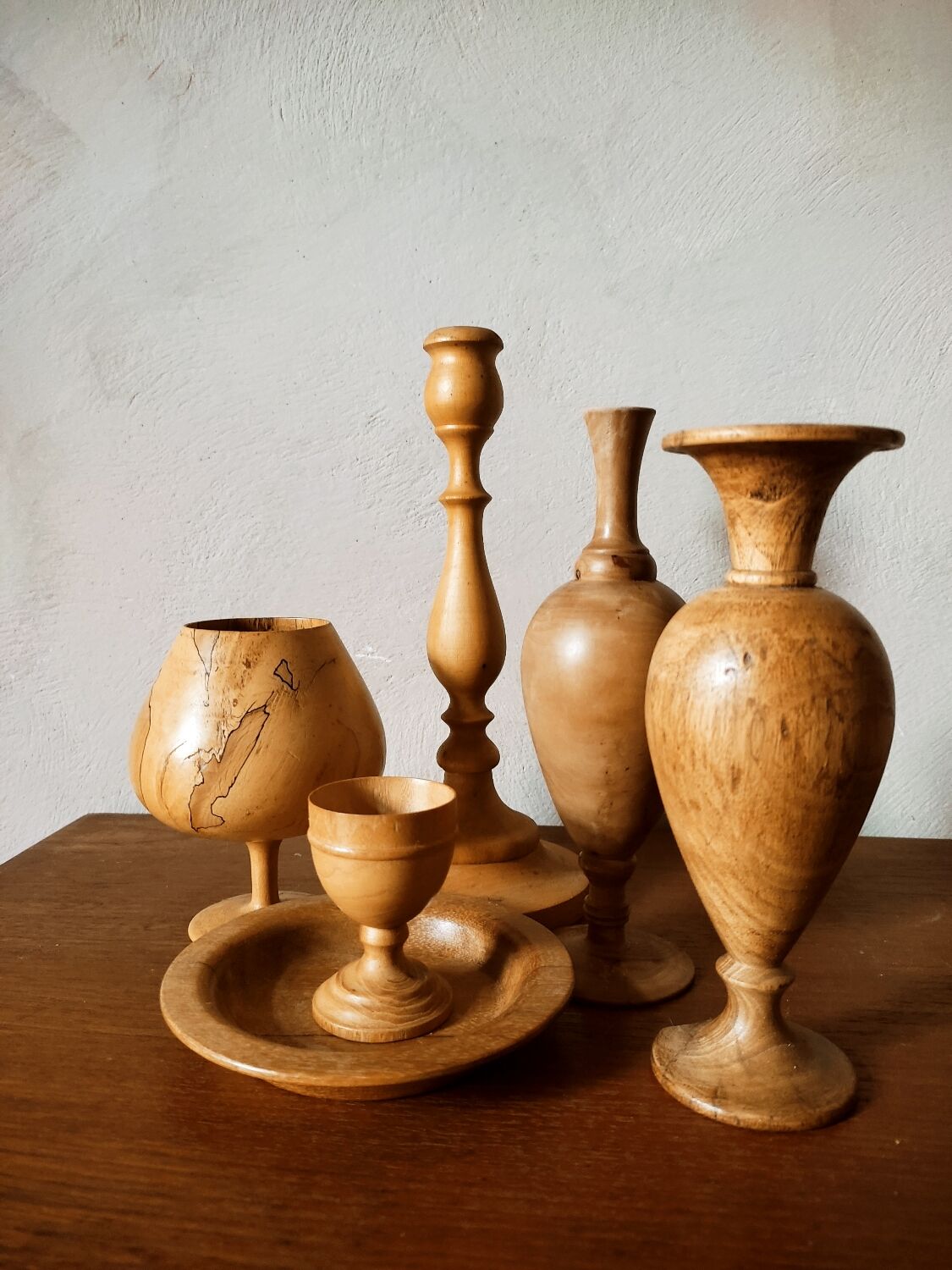 Composition of vases and cups in turned wood