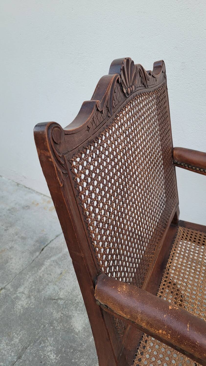 Louis XV Regency cane armchair leather armrests decorated with shell