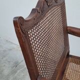 Louis XV Regency cane armchair leather armrests decorated with shell