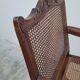 Louis XV Regency cane armchair leather armrests decorated with shell
