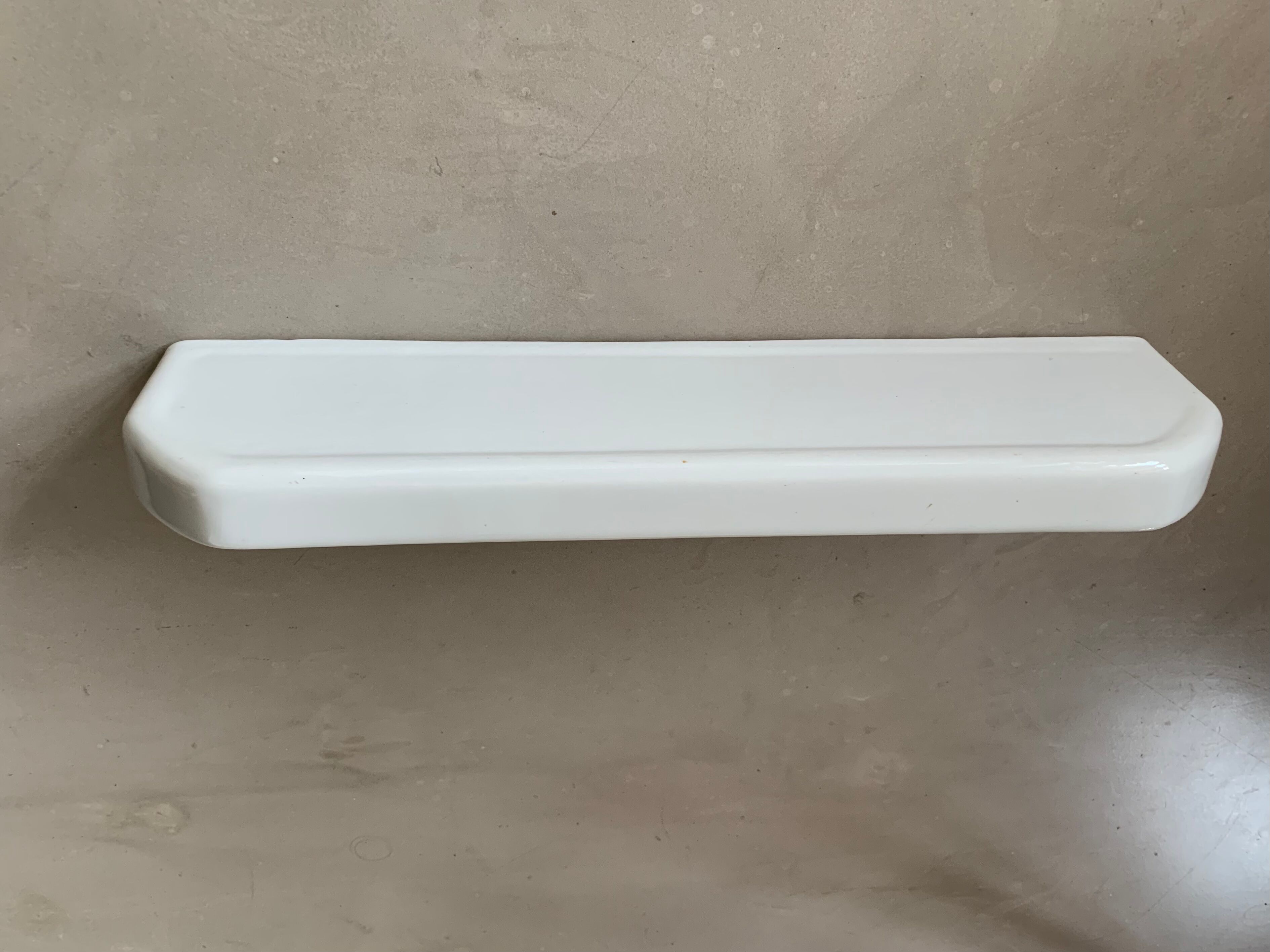 Antique ceramic wall shelf