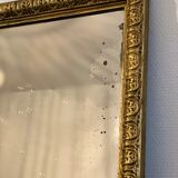 Old rectangular mirror between two golden Louis Philippe