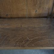 Antique oak church bench in Gothic style with beautiful wood carving