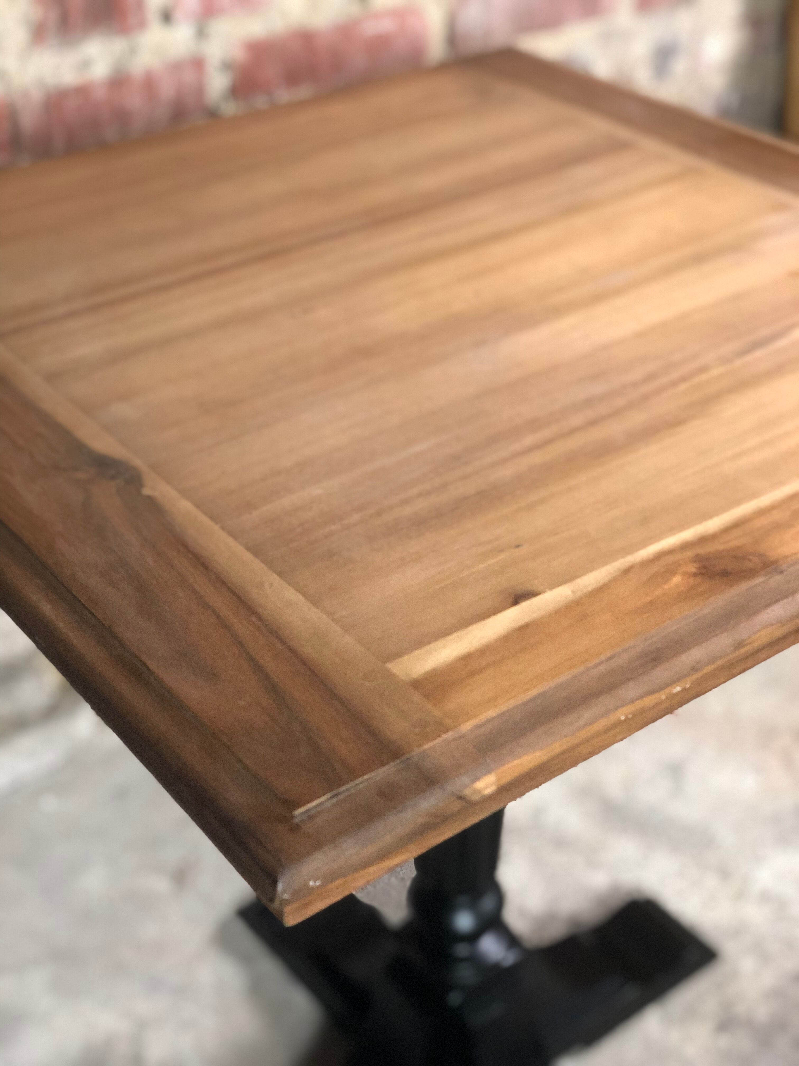 Bistro table in wood black foot and raw top