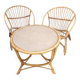 Vintage rattan wicker garden furniture set with 2 shell armchairs and a bar table