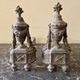 Pair of bronze andirons in Louis XVI style, late 19th century.