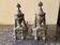 Pair of bronze andirons in Louis XVI style, late 19th century.