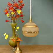 Suspension globe vintage en verre granité jaune et doré