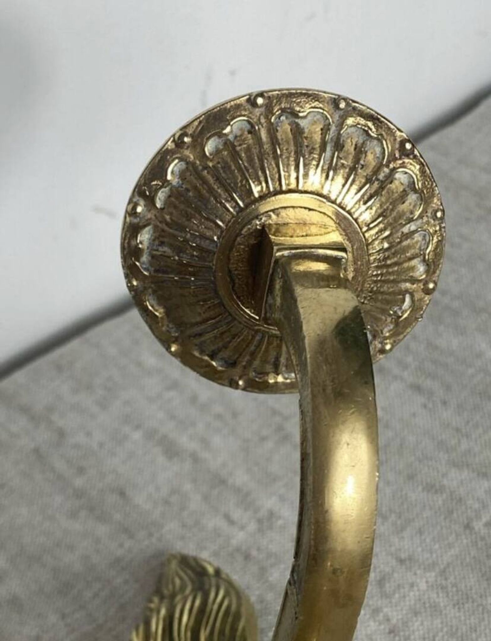 Pair of wall candle holders in bronze