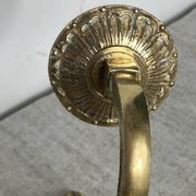 Pair of wall candle holders in bronze