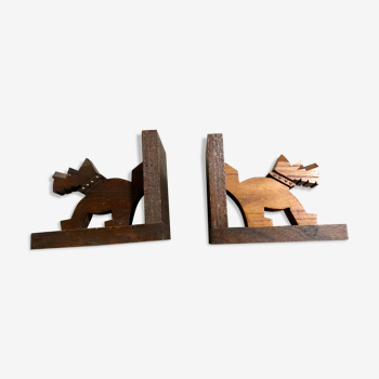 Pair of greenhouse books wooden dogs