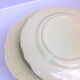Lot of 10 pale green flower plates