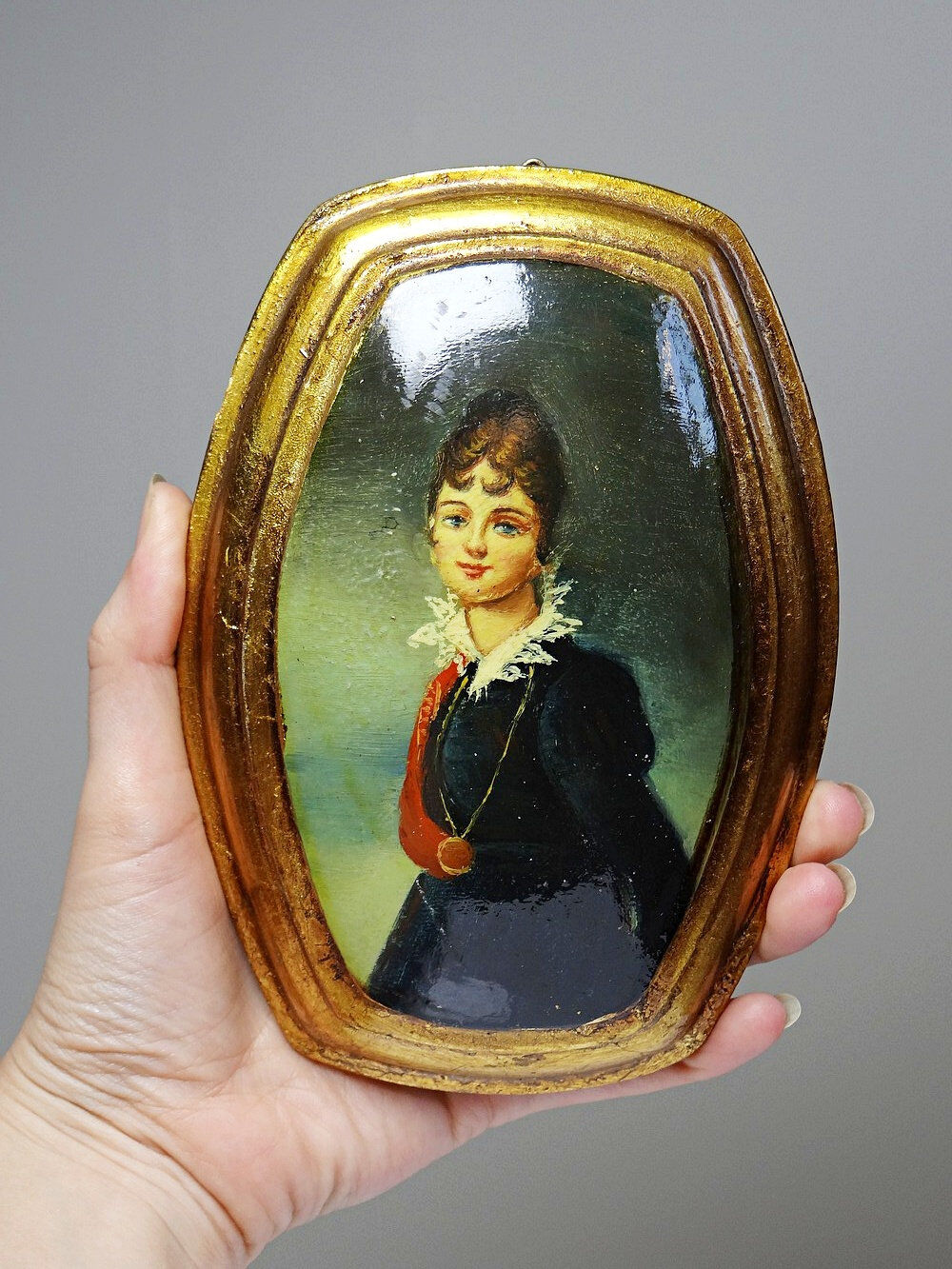 Small vintage Venetian oil on wood convex medallion portrait.