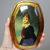 Small vintage Venetian oil on wood convex medallion portrait.