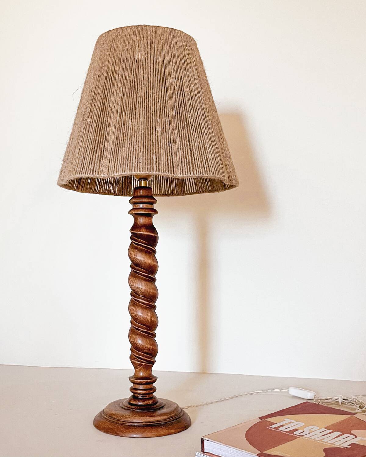 Turned wood lamp and jute lampshade
