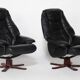 Pair of Danish black leather recliner swivel chairs by Hjort Knudsen