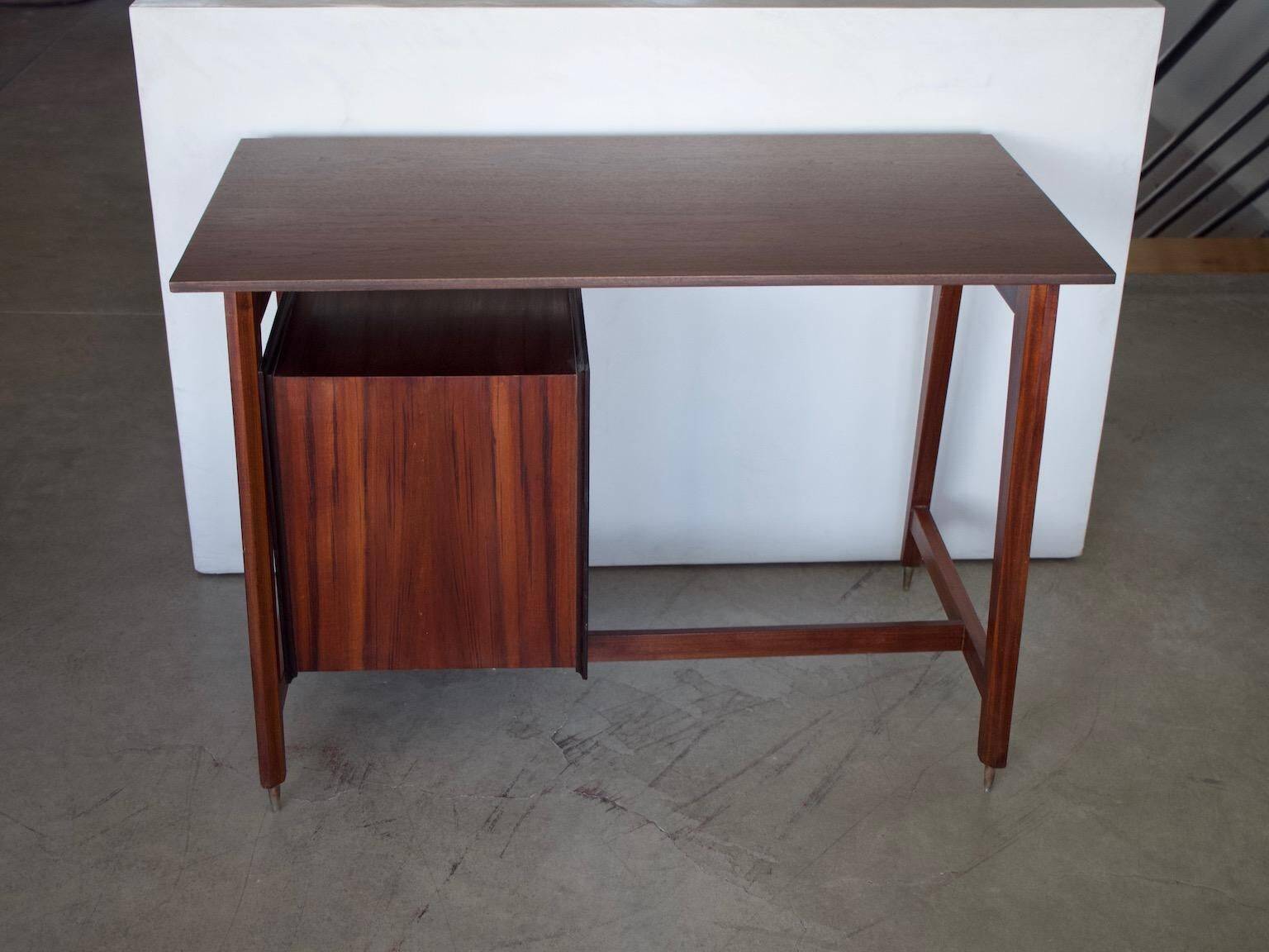Small Italian wooden desk with brass details.