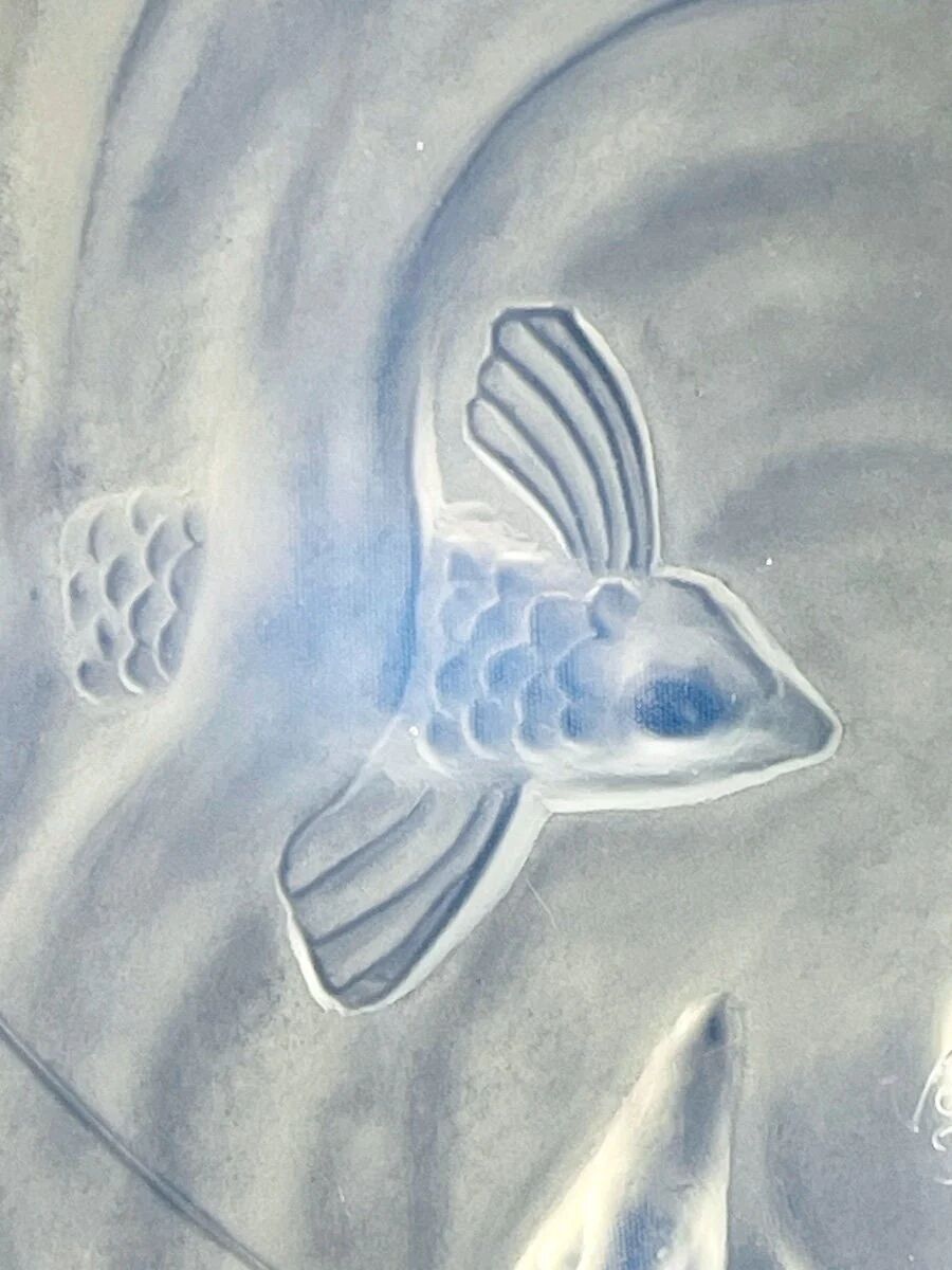Verlys, iridescent glass cut with a design of geese and fish.