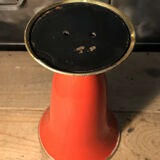 Cut vase on foot in red and black metal