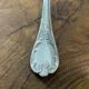 Series of 12 Christofle model Marly dessert spoons in silver metal