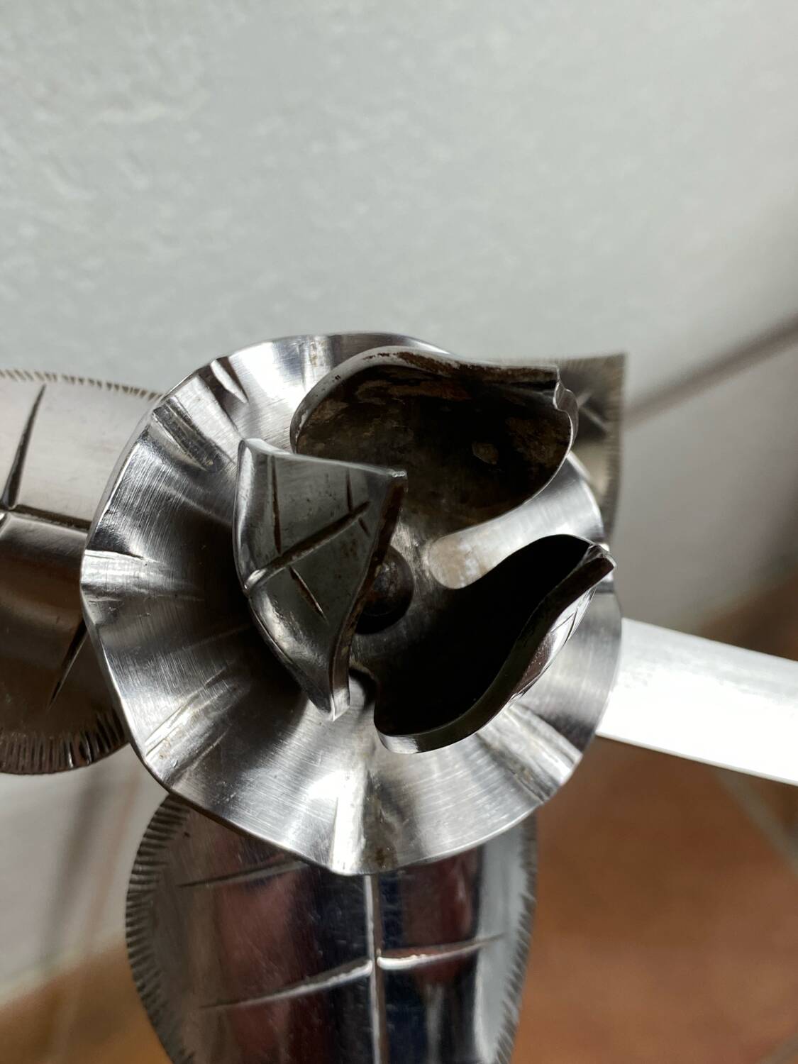 Silver-plated metal flower candle holder